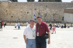 Image of Mel Mann and Irv Kempner in front of the Kotel western wall