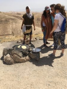 Image of Starting at the Kotel to camel rides and making pita bread outside.