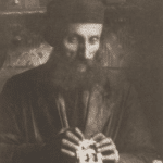 Image of Naftole Grinband, a clockmaker. Gora Kalwaria (Yiddish: Ger), 1928.