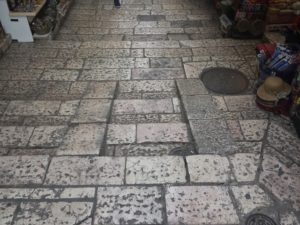 Image of Jerusalem market cobblestone street.