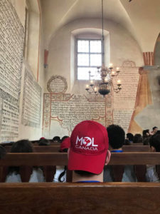 Image of MOTL students visit Tycochin in April 2018, town and burial pits where Jews were shot.